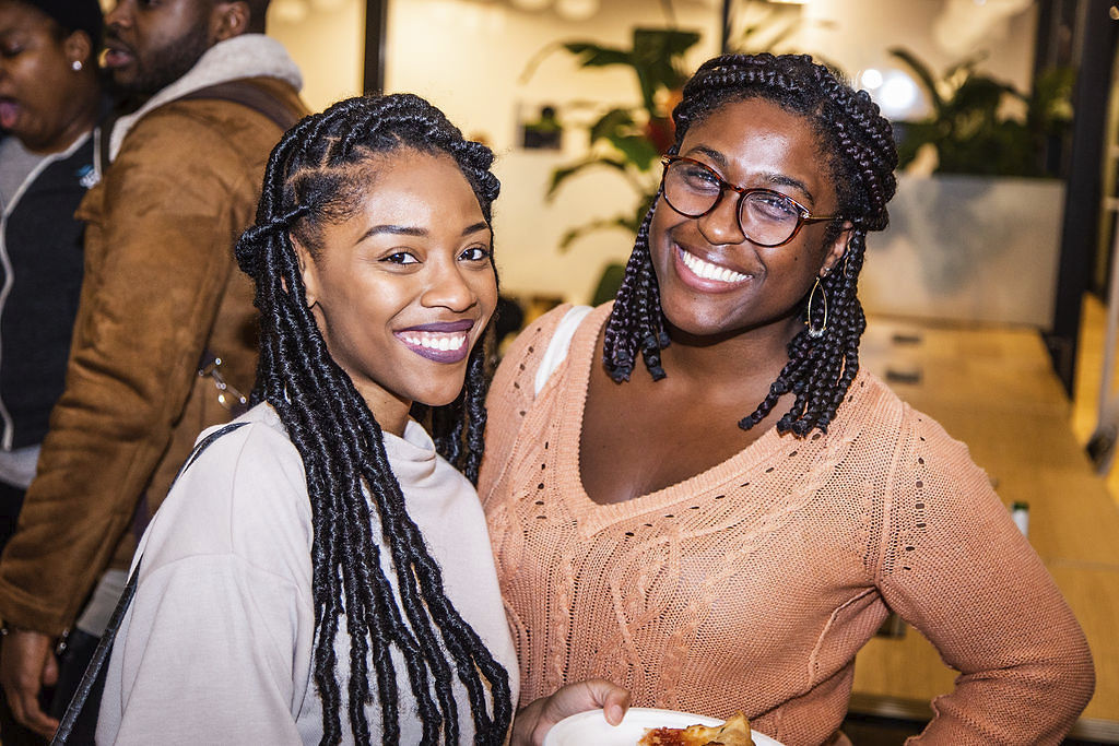 Two professional African women working together
